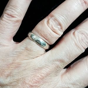 Delicate sterling band with scroll design